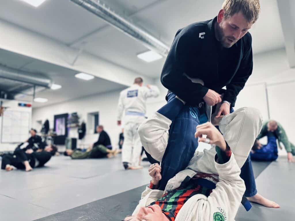 Drilling Single-Leg X Guard in the evening Fundamentals class at Sanctuary Jiu-Jitsu. 